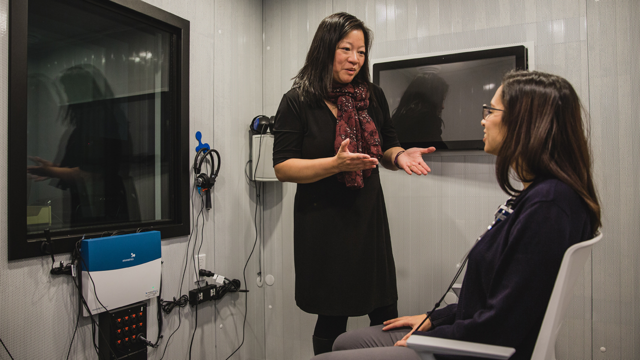 Two woman in room with assistive devices